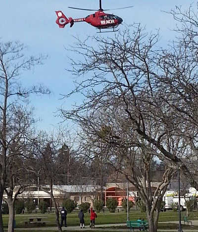 REACH 18 lands at Redbud Park in Clearlake, Calif., on the afternoon of Sunday, January 11, 2015, to pick up a man who was injured in a crash involving a motorcycle and a vehicle. Photo by Greg Atherton. 011115reachcrashsite