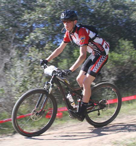 Gabe Wind attacking a turn at a NorCal Cycling League event in Seaside, Calif., on Sunday, March 1, 2015. Photo courtesy of Jeffrey Cramer. 030115bikewind