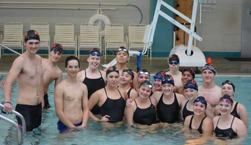 The entire combined high school swim team from Clear Lake High School and Kelseyville High School at their first swim meet of the year in Fort Bragg, Calif., on Thursday, March 12, 2015. Photo by Beth Rudnick. 031215swimteamgroup
