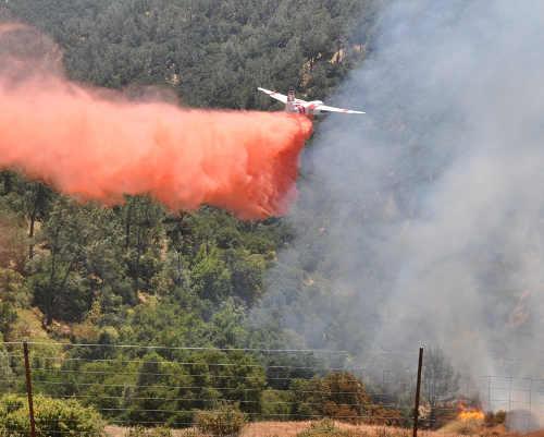 Cal Fire Tanker 91 checks along the southern flank of the Chiles Fire east of St. Helena, Calif., on Tuesday, June 16, 2015. Photo courtesy of Cal Fire. 061615chilestanker
