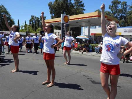 Lower Lake High School Cheerleaders performed in this year's Redbud Parade and Festival in Clearlake, Calif., on Saturday, July 5, 2014, walking away with a couple trophies in hand. Photo by Denise Rockenstein/Lake County News. 070514llhscheer