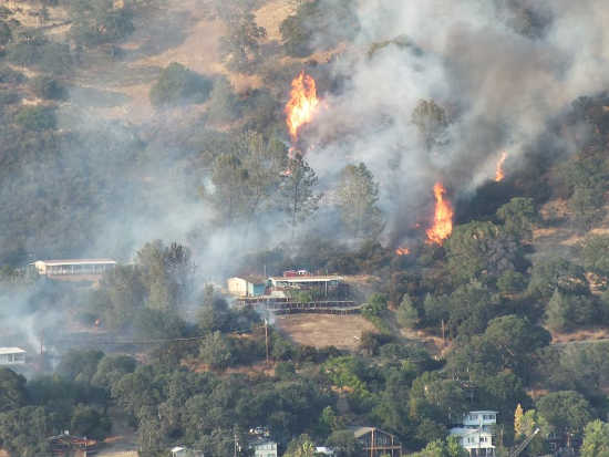 Firefighters battled a wildland fire on Lakeshore Drive in Clearlake, Calif., on Thursday, July 30, 2015. Photo by Brittany Hazelton. 073015lakeshorebrittanyhazelton