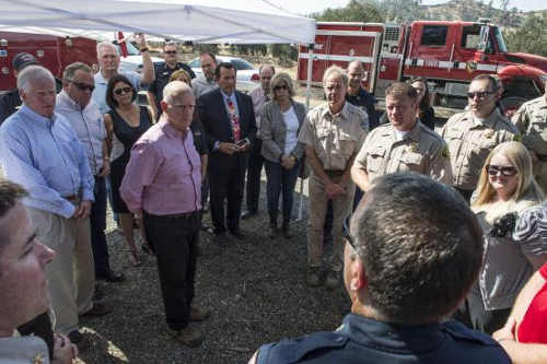 Affected community members and emergency personnel talk to Gov. Jerry Brown about the Rocky Fire and its impacts on the community on Thursday, Aug. 6, 2015, in Colusa County, Calif. Among those at the briefing were Congressman Mike Thompson, Assemblyman Bill Dodd, Lake County Supervisor Jeff Smith, Clearlake Police Chief Craig Clausen, Lake County Administrator Matt Perry, Northshore Fire Protection District Chief Jay Beristianos, Sheriff Brian Martin, sheriff's Sgt. Norm Taylor and Lake County Office of Emergency Services Manager Marisa Chilafoe. Photo Credit: Brad Alexander, Governor’s Office of Emergency Services. 080615rockyfireofficials