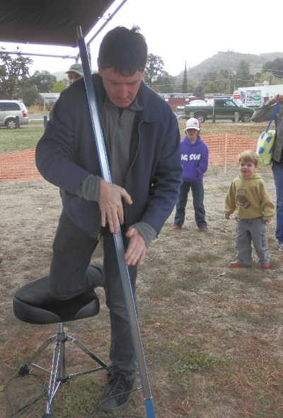 Musician Andy Graham of Santa Rosa, Calif., takes the stage with his “slapstick” at 2 p.m. Sunday, October 26, 2014, during “Spirits on the Loch” at Austin Park in Clearlake, Calif. Photo by Denise Rockenstein/Lake County News. 102514spiritsstick