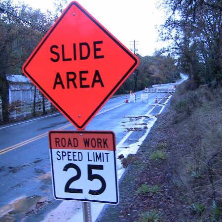 County officials are cleaning up debris and have closed a portion of Hill Road East near Lakeport, Calif., due to concerns about the potential for a landslide. Photo by John Jensen/Lake County News. 120314slidearea