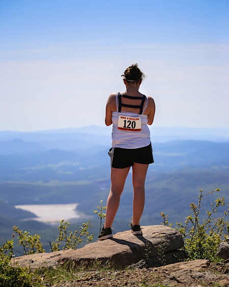 A hiker and the view from the top on Mount Konocti in Lake County, Calif., during the inaugural “Hike 4 Healing” in 2014. Courtesy photo. 2014healinghikesingle