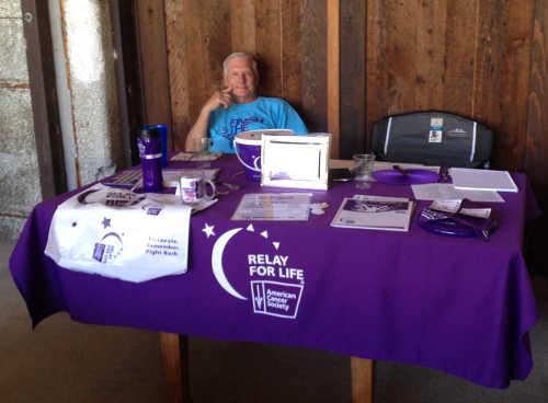 Glenn Courtney of Lakeport, Calif., is a 15-year cancer survivor and was manning one of the raffle ticket sales tables during the 2014 Wine Adventure in Lake County, Calif. Courtney also is a team captain for Angels Among Us. Courtesy photo. 2014relayforlifepartner