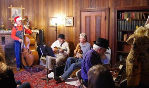 Community members enjoy music in the ranch house at a previous Old-Fashioned Christmas Open House at Anderson Marsh State Historic Park in Lower Lake, Calif. Courtesy photo. amiachristmasgroup