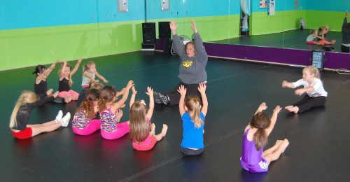 Danita Shook with some of her young cheerleading students. Courtesy photo. cheerleadingstudents