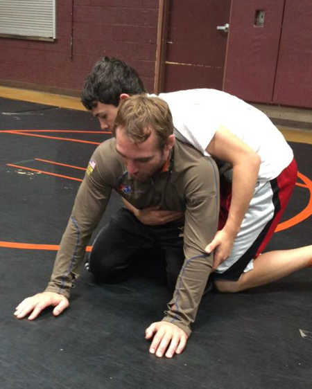 NCAA All-American Daniel Dennis and a student wrestler during the Lake County Wrestling Club camp in Kelseyville, Calif., which was held from Thursday, June 18, to Sunday, June 21, 2015. Photo courtesy of Adam Garcia. june2015wrestlingcamp1