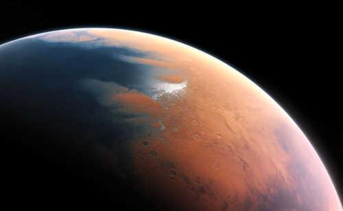 This artist’s impression shows how Mars may have looked about four billion years ago. The young planet Mars would have had enough water to cover its entire surface in a liquid layer about 140 meters deep, but it is more likely that the liquid would have pooled to form an ocean occupying almost half of Mars’ northern hemisphere, and in some regions reaching depths greater than 1.6 kilometers. Credit: ESO/M. Kornmesser. mars4billionago