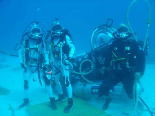 NEEMO 16 aquanauts Kimiya Yui and Tim Peake pose with their support diver and astronaut Mike Gernhardt in the DeepWorker single-person submarine. Photo courtesy of NASA. neemo20