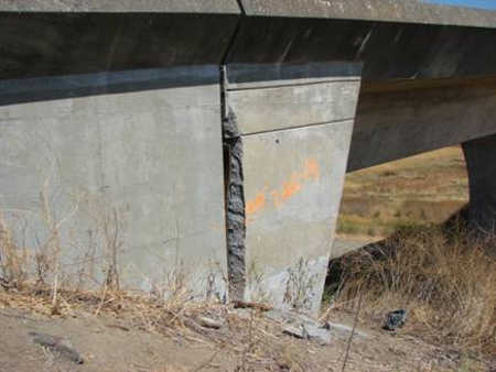 As a result of the earthquake on Sunday, August 24, 2014, a section of concrete measuring 6 inches by 6 feet broke off, exposing rebar at the abutment/wingwall joint of the George Butler Bridge on Highway 29 in Napa, Calif. Photo courtesy of Caltrans. quakerepairsbridge
