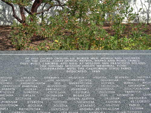A stone memorial outside Mission San Francisco Solano in Sonoma County, Calif., that includes the names of Pomo from Lake County, Calif. Photo by Kathleen Scavone. scavonemissionplaque1
