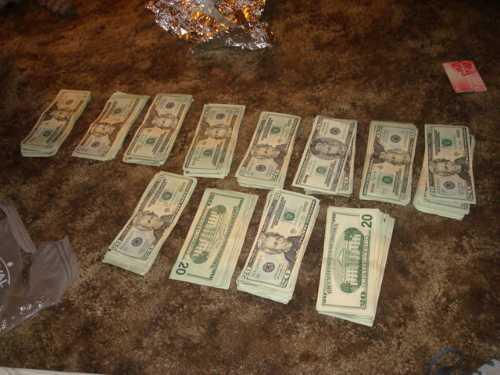 080912rhodesarrestcash