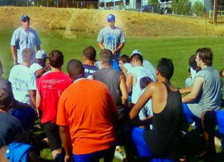 The team listens to coaching staff during a recent practice at Lower Lake High School in Lower Lake, Calif. 082012llfootballcoaches