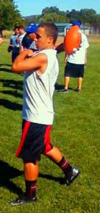 Richard Tucker, who led the county in passing yards in 2011, passes the football during a Lower Lake High School practice in Lower Lake, Calif. Photo by Rich Mellott. 082012llfootballtucker