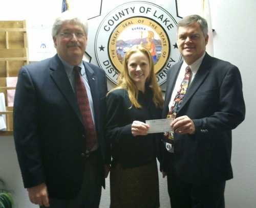 From left, Lake County Superintendent of Schools Wally Holbrook, Stephanie Wayment of the Lake County Office of Education and Lake County District Attorney Don Anderson, who presented a check to help support the new Mock Trial Program in Lake County, Calif. Photo courtesy of the Lake County Office of Education. damocktrialdonation