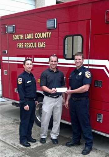 FM Global representatives presented the award to Jordan Hale and Scott Weatherby at Station 60 in Middletown, Calif. Photo courtesy of South Lake County Fire Protection District. fmglobalgrant2
