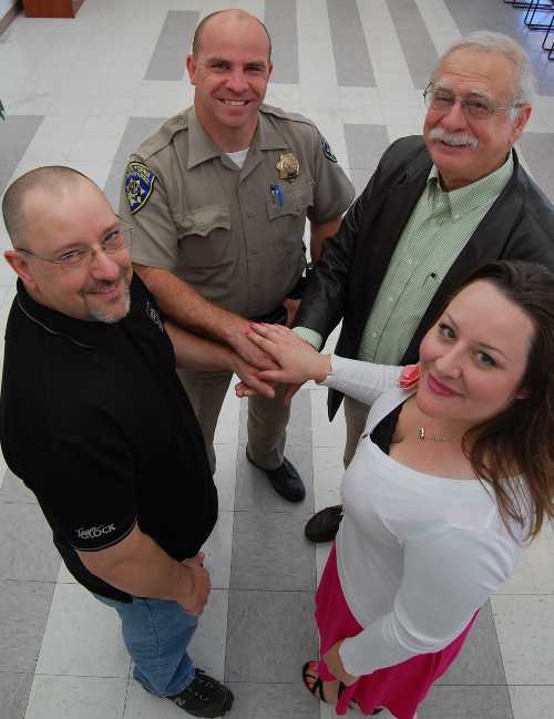 Clockwise, from top, California Highway Patrol Officer Steve Curtis, Dr. Mark Cooper, Nicole Newton and businessman Bob Rider get together in Clearlake, Calif., to mark their unique relationships: Newton donated a kidney to Cooper and Curtis donated a kidney to Rider. Photo by John Lindblom. 041313kidneyfeatur2