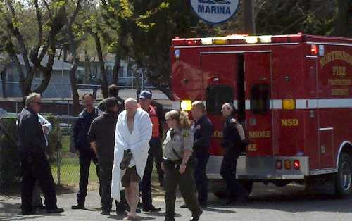 A kayaker was pulled apparently unharmed from Clear Lake near Nice, Calif., on Monday, April 15, 2013, after his boat overturned in choppy conditions. Photo by John Jensen. 041513kayakerrescued