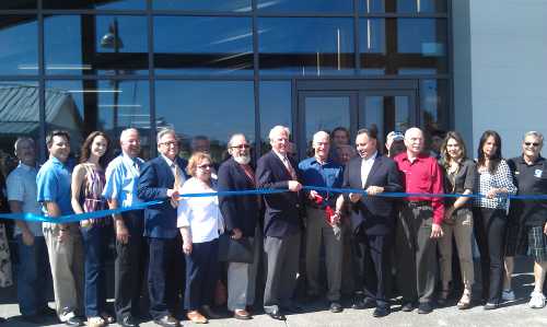 City, county and Mendocino College officials gather for the ribbon cutting at the new Mendocino College Lake Center in Lakeport, Calif., on Wednesday, May 1, 2013. Photo by Elizabeth Larson. 050213lakecenterribbon