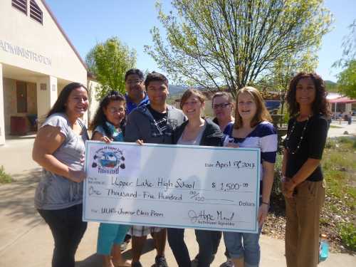 The Habematolel Pomo of Upper Lake, Calif., donated $1,500 to Upper Lake High School’s junior class for its annual prom. From left, Habematolel Tribal Executive Council Treasurer Kim Cobarrubia, Tribal Executive Council Vice Chair Angelina Arroyo, Habematolel Tribal Administrator Anthony Arroyo Sr., tribal member and Junior Class Secretary/Treasurer Anthony Arroyo Jr., Junior Class President Marcella Stifter, Tribal Executive Councilmember Aimee Jackson Penn, Junior Class Vice President Savanah Fecht and Habematolel Tribal Chair Sherry Treppa. Courtesy photo. ulhshabematolelcheck