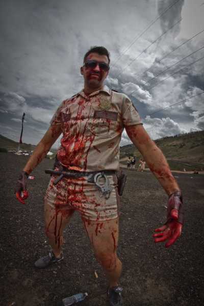 A participant in a “Run for Your Lives” charity run. Courtesy photo. zombiecop