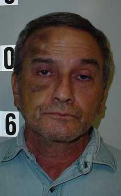 Antonio Hector Molinar, 66, of Hidden Valley Lake, Calif., was arrested on Thursday, August 22, 2013, for impersonating a peace officer. Lake County Jail photo. 082213molinarmug