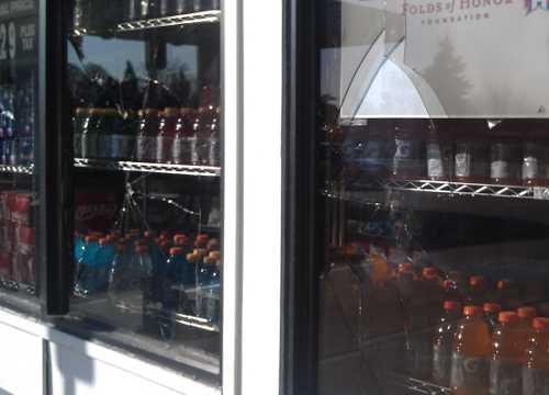 Windows on the front of the Tower Mart in Nice, Calif., were smashed out early on the morning of Saturday, February 24, 2013. Photo by Elizabeth Larson. 022313towermartwindow