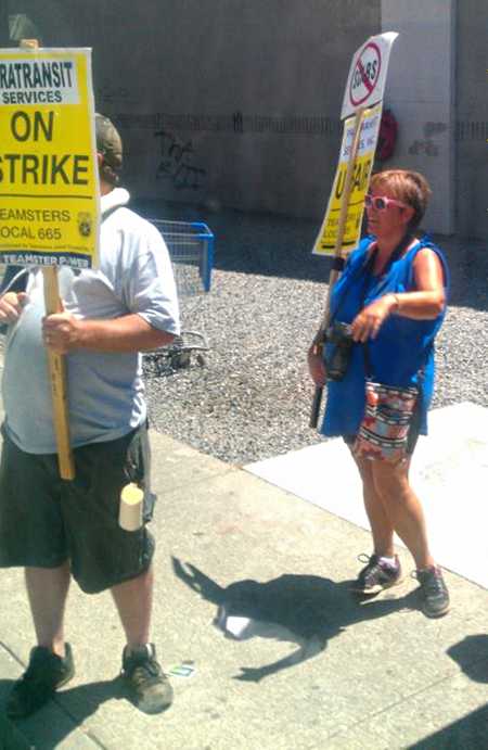 Lake Transit workers picketing at a bus stop on Wednesday, July 31, 2013. Photo courtesy of Ashley Savage. 073113transitstrike