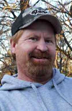 Shane Franklin Miller, 45, of Shingletown, Calif., has been placed on the U.S. Marshals Service's list of 15 Most Wanted fugitives in connection with the May 2013 murders of his wife and two young daughters. Photo courtesy of the US Marshals Service. shanemiller