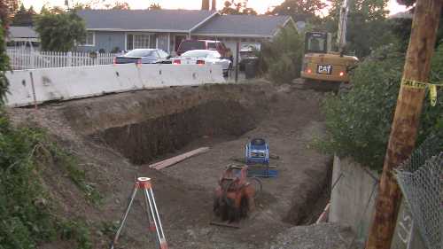 Work is under way to increase the size of culverts along Victoria Creek in Lucerne, Calif., in an effort to mitigate flooding problems. Photo by John Jensen. 060513victoriachannelfinal
