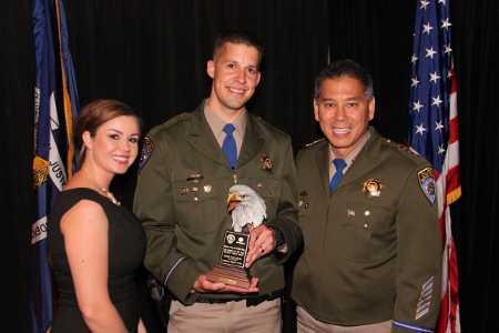 California Highway Patrol Officer Tyler Carlton, his wife, Cynthia, and CHP Commissioner Joe Farrow. Officer Carlton received the International Association of Chiefs of Police “Trooper of the Year” Award. Photo by Louisiana State Trooper Caesar Taylor. 031513chpcarltonaward