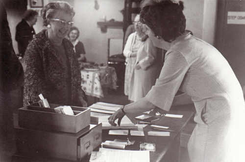 Middletown Gibson Library and Lake County Library project. December 7, 1971 was opening day at Middletown Library under the Lake County Library Project. A reception was held to mark the occasion. The woman on the right might be Mary Robertson, a Library Project employee; no one else is identified. Photo from the files of the Lake County Library Project. 1971gibsonlibraryopeningday