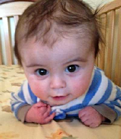 Five-month-old Ryland Joseph of Lake County, Calif., has been diagnosed with a rare condition called Wiskott-Aldrich Syndrome, and needs a bone marrow transplant in order to survive. Photo by Kellie Joseph. rylandjosephcrib