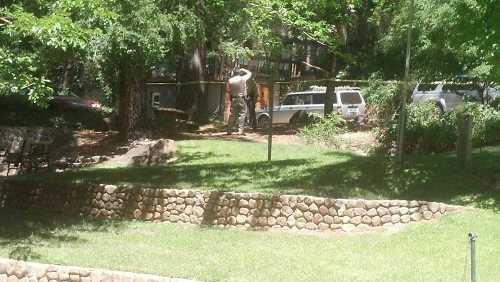 The struggle between the male subject and officers who were at this home in Anderson Springs, Calif., for a civil standby occurred on the morning of Thursday, May 30, 2013. Photo by Johanna Leuzinger. 053013leuzingershootingscene