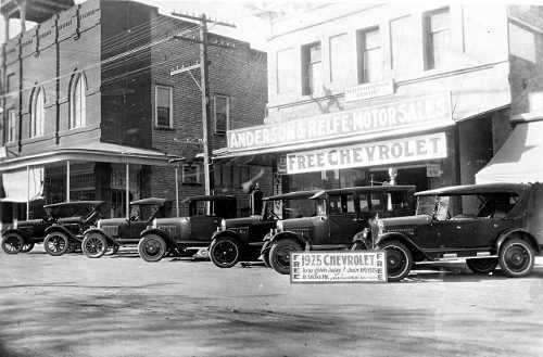 Heat from the 1925 fire cracked windows at Anderson & Relfe’s Chevrolet dealership north of Fourth Street. Many buildings in downtown Lakeport sported wooden awnings such as these seen in this photograph. 1920slakeportchevydealers