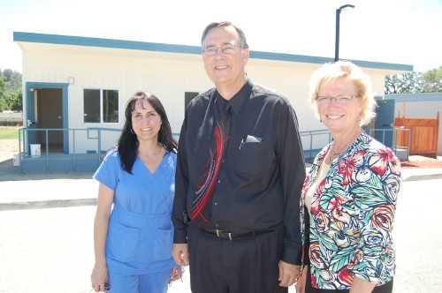 Konocti Unified nurse Susan Salmina, Lower Lake High School Principal Jeff Dixon and Konocti Unified School District Superintendent Donna Becnel in front of new health care center at Lower Lake High School in Lower Lake, Calif. Photo by John Lindblom. llhsclinicgroup