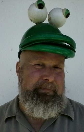 Thanks to his father-in-law, John Moorhead of Lakeport, Calif., has this snazzy new frog hat to help protect his head from the sun after he had his head shaved on Tuesday, May 14, 2013, as part of a fundraiser for Relay for Life. Photo courtesy of John Moorhead. moorheadfroghat