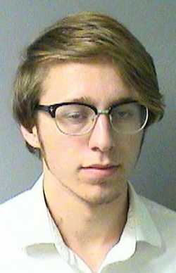 Phoenix Triton King, 20, a homeless man who formerly lived in Lake County, Calif., is wanted on murder and attempted murder charges for killing one man and wounding a second with a crossbow near Eureka, Calif., on Sunday, September 8, 2013. Here he's shown in a March 2013 booking photo from the Lake County Jail. A second suspect, a 16-year-old girl who is with him, is wanted in the case, but her name has not been released due to her age. 031113tritonkingmug