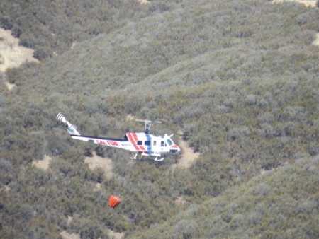 A Cal Fire helicopter helped contain a small wildland fire near Lakeport, Calif., on Thursday, September 19, 2013. Courtesy photo. 091913cowfirecopter