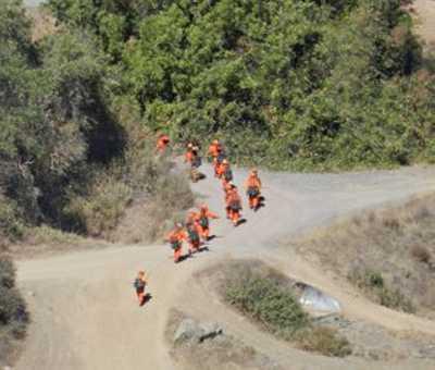 Hand crews at the scene of a small wildland fire near Lakeport, Calif., on Thursday, September 19, 2013. Courtesy photo. 091913cowfirecrew