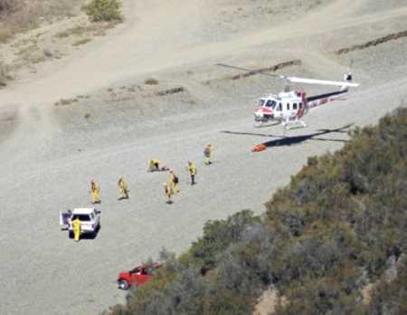 Fire crews at the Cow Fire near Lakeport, Calif., on Thursday, September 19, 2013. Courtesy photo. 091913cowfirecrewcopter