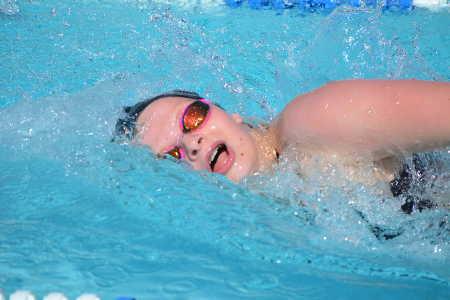 Lauren Rudnick, swimming a leg of the unbeaten 400 Freestyle Relay event on Thursday, April 10, 2014. Photo by Beth Rudnick. 041014rudnickswimmeet