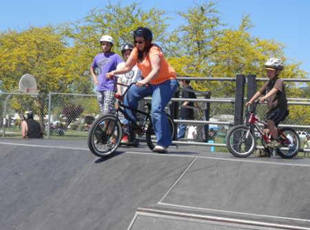 Clearlake Vice Mayor Gina Fortino Dickson tests her skills on the skate park ramps. at the annual “Andy Day” at the Clearlake Skate Park on Saturday, April 12, 2014, in Clearlake, Calif. Photo by Denise Rockenstein. 041214ginaskatepark