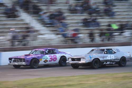 Eddie Klein and Gino Buchignani race in the Bombers Division at the Lakeport Speedway on Saturday, April 19, 2014. Photo by Cindy Pickrell. 041914bombers38