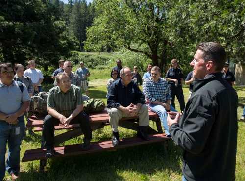 Ron Williams of the Cal OES Logistics division briefs locals near the airport in Arcata, Calif. about the purpose of the air bridge exercise on Tuesday, May 13, 2014. Photo courtesy of California Office of Emergency Services. 051314quakewilliams