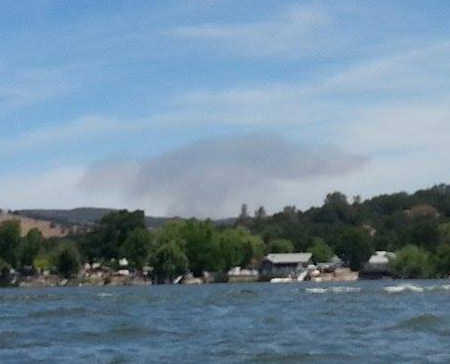 The plume of smoke from the Indian Fire east of Clearlake Oaks, Calif., seen from Clear Lake on Sunday, May 25, 2014. Photo by Gregory Atherton. 052514athertonsmoke