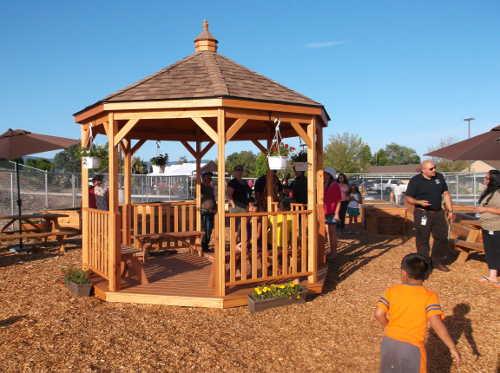Community members visit the gazebo in the new garden on the Lake County Tribal Health Consortium grounds in Lakeport, Calif., on Thursday, May 29, 2014. Photo by Elizabeth Larson/Lake County News. 052914tribalgardengazebo